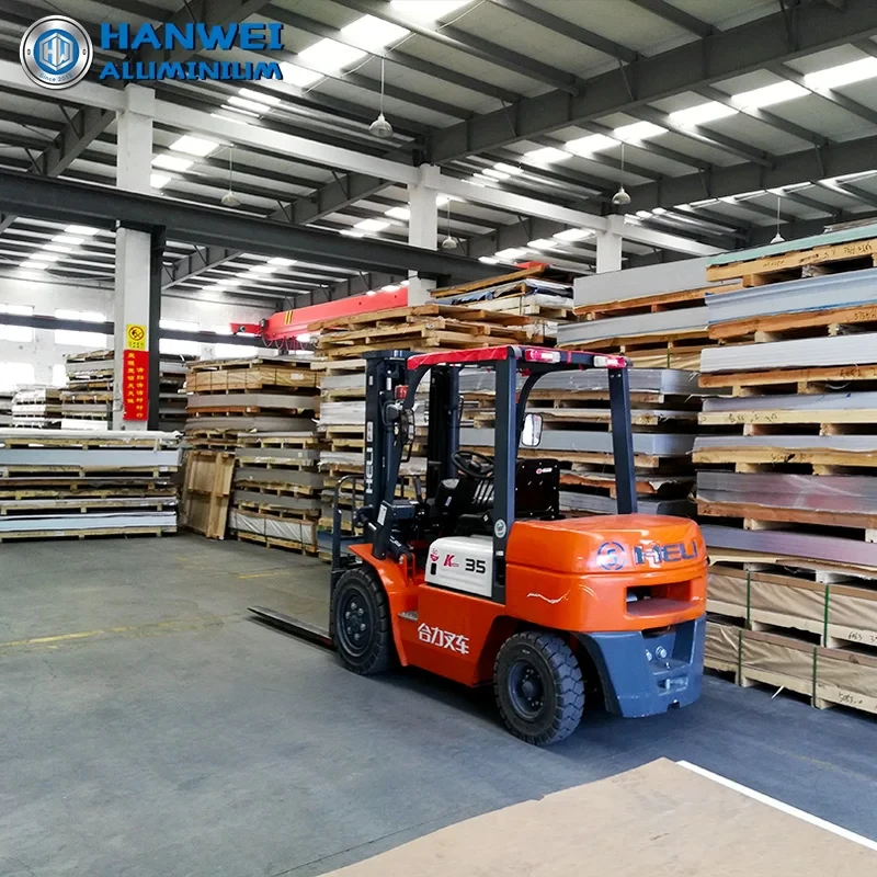 Aluminium 6082-T6 sheet plates stacked in warehouse